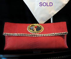 Python Oversize Clutch Red Acc Stone